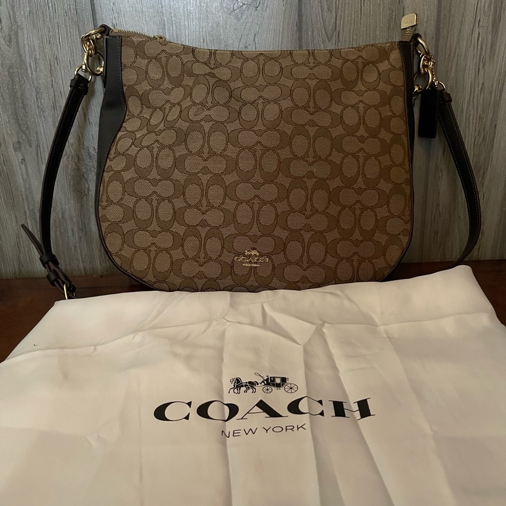 Coach Saddle Bag 11” across bottom and 10” high